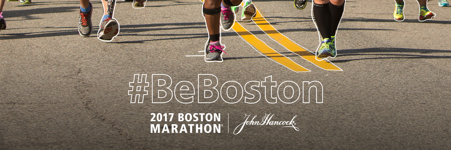 runners racing down the street with #BeBoston
